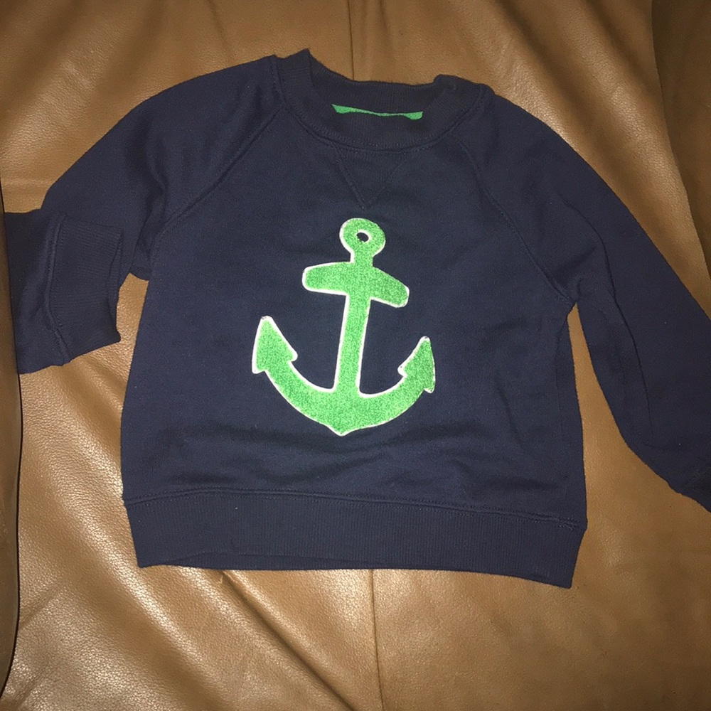 Navy blue sweatshirt w/ green anchor decal
